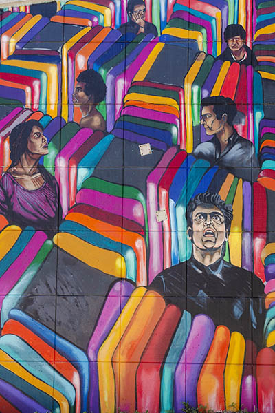 Close up of mural Confinement and Escape, by Austin artist ULOANG